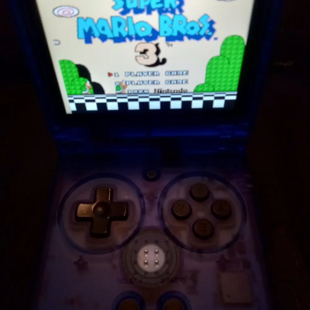 Pre-Loaded Anbernic RG35XXSP blue transparent with most retro platforms 64gb
